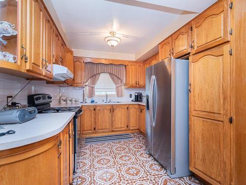 Cuisine - 4960  - 4962 Boul. Notre-Dame, Laval (Chomedey), QC - Indoor Photo Showing Kitchen With Double Sink