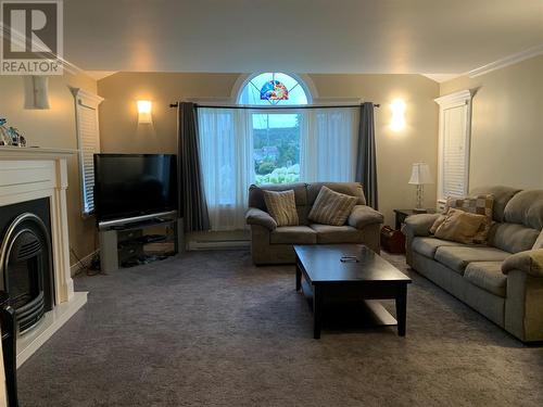 26 Frecker Place Extension, Placentia, NL - Indoor Photo Showing Living Room With Fireplace