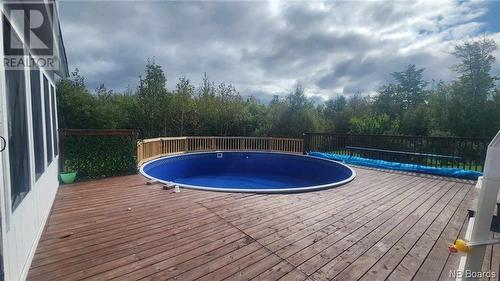 1021 Champagne, Dunlop, NB - Outdoor With Above Ground Pool With Backyard