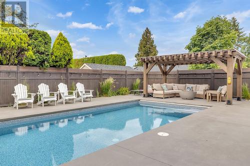 452 Knowles Road, Kelowna, BC - Outdoor With In Ground Pool With Deck Patio Veranda With Backyard