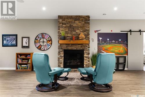 4326 Wild Rose Drive, Regina, SK - Indoor With Fireplace