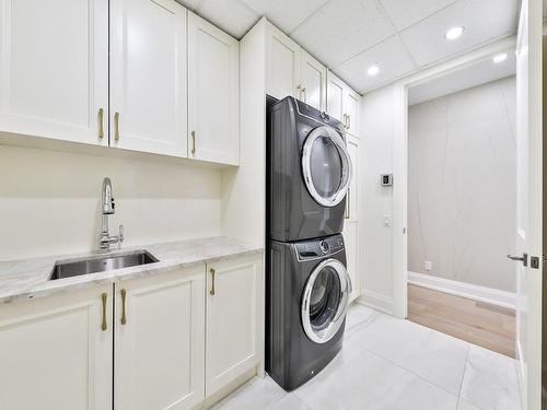 Salle de lavage - 1008-4400 Prom. Paton, Laval (Chomedey), QC - Indoor Photo Showing Laundry Room