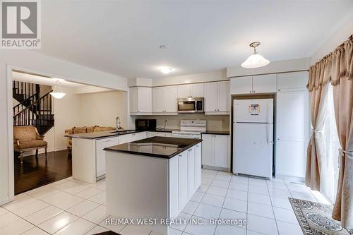 142 Coho Dr, Whitby, ON - Indoor Photo Showing Kitchen With Double Sink