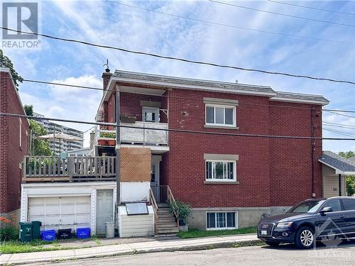 110 Genest exterior with garage and back staircase - 110 Genest Street, Ottawa, ON - Outdoor
