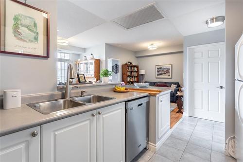 2300 Parkhaven Boulevard|Unit #407, Oakville, ON - Indoor Photo Showing Kitchen With Double Sink