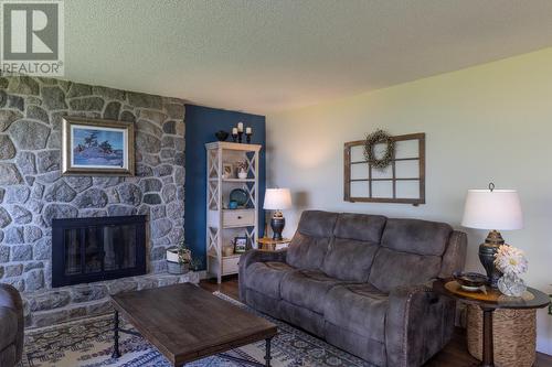 1116 Naramata Road, Penticton, BC - Indoor Photo Showing Living Room With Fireplace