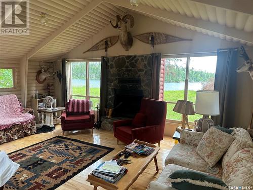 Titled Cabin On Rainy Island, Lac La Ronge, SK - Indoor Photo Showing Living Room With Fireplace