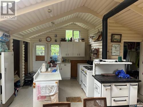 Titled Cabin On Rainy Island, Lac La Ronge, SK - Indoor Photo Showing Kitchen