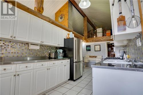 252 Pothier, St. Charles, ON - Indoor Photo Showing Kitchen With Double Sink