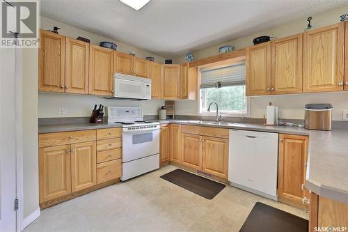 113 Glenn Bay, Milestone, SK - Indoor Photo Showing Kitchen With Double Sink