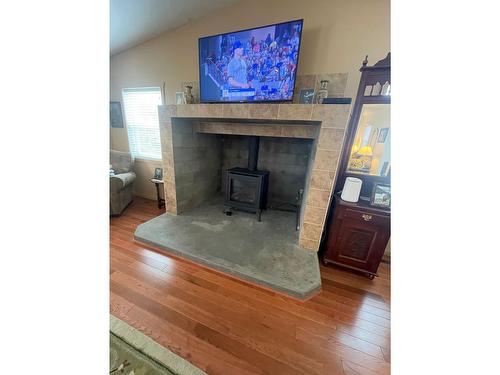 465 Atwood Road, Grand Forks, BC - Indoor Photo Showing Living Room With Fireplace