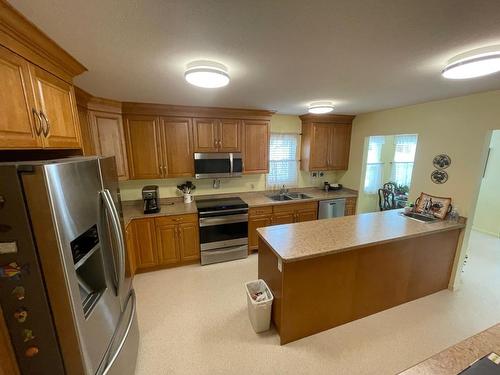 465 Atwood Road, Grand Forks, BC - Indoor Photo Showing Kitchen With Double Sink