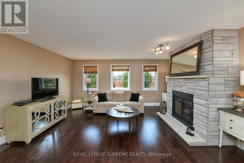 654 Ashprior Ave, Mississauga, ON - Indoor Photo Showing Living Room With Fireplace
