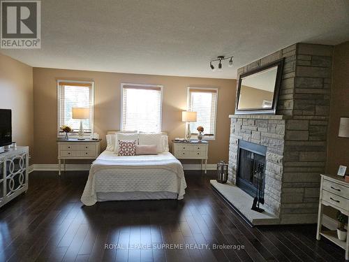 654 Ashprior Ave, Mississauga, ON - Indoor Photo Showing Bedroom With Fireplace
