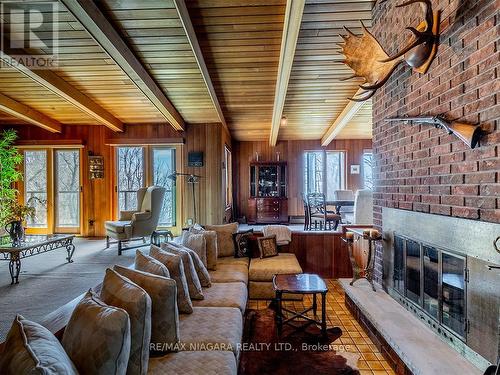 10201 Camelot Drive, Wainfleet, ON - Indoor Photo Showing Living Room With Fireplace