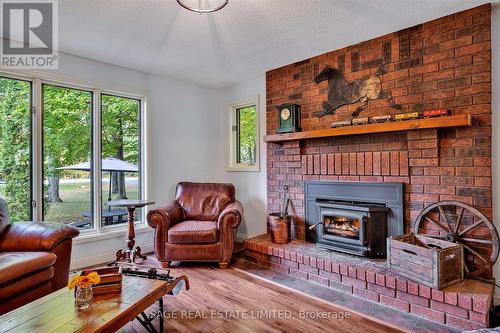 465 County Road 24, Kawartha Lakes, ON - Indoor Photo Showing Living Room With Fireplace