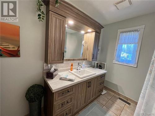 70 Thompson Street, Charlo, NB - Indoor Photo Showing Bathroom