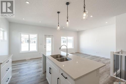 311 170 Mirond Road, Martensville, SK - Indoor Photo Showing Kitchen With Double Sink