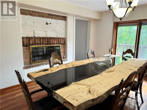 3301 9Th Line Road, Ottawa, ON - Indoor Photo Showing Dining Room With Fireplace