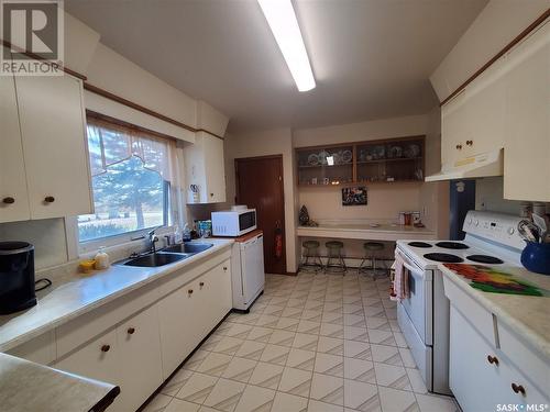 304 Stewart Street, Kamsack, SK - Indoor Photo Showing Kitchen With Double Sink