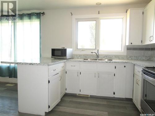 112 Bell Road, Assiniboia, SK - Indoor Photo Showing Kitchen With Double Sink
