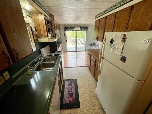 8875 North Fork Rd, Grand Forks, BC - Indoor Photo Showing Kitchen With Double Sink