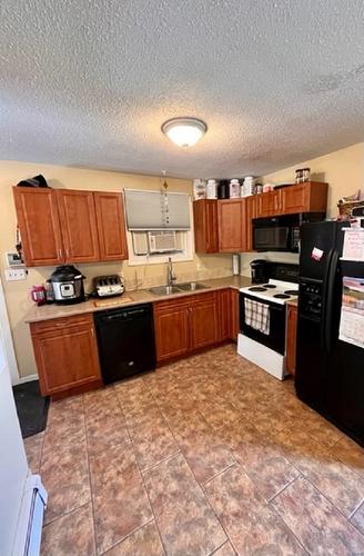 168 Centennial Drive, Longlac, ON - Indoor Photo Showing Kitchen With Double Sink