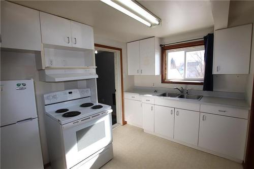 15 Hill Street, Flin Flon, MB - Indoor Photo Showing Kitchen With Double Sink