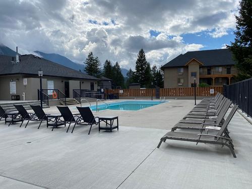 712 - 700 Bighorn Boulevard, Radium Hot Springs, BC - Outdoor With In Ground Pool With Deck Patio Veranda