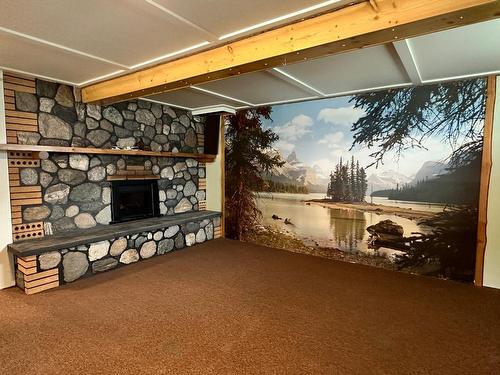 6195 19Th Street, Grand Forks, BC - Indoor Photo Showing Other Room With Fireplace