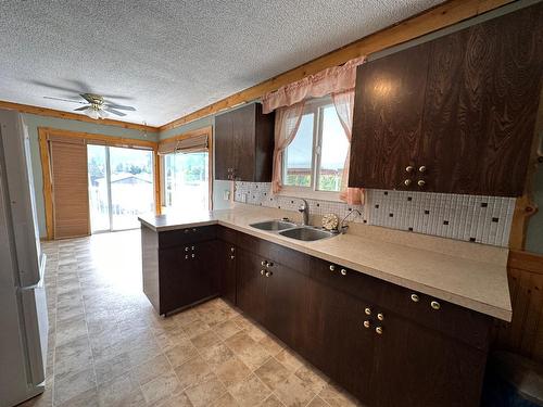6195 19Th Street, Grand Forks, BC - Indoor Photo Showing Kitchen With Double Sink