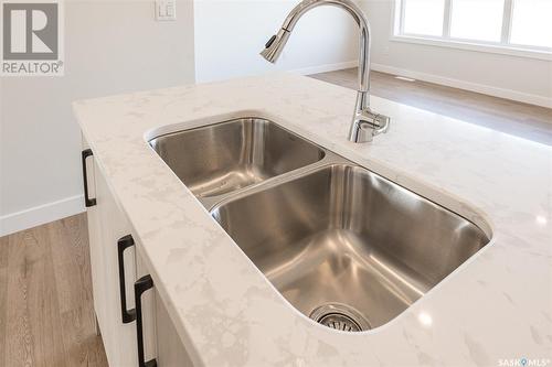 127 Doran Way, Saskatoon, SK - Indoor Photo Showing Kitchen With Double Sink