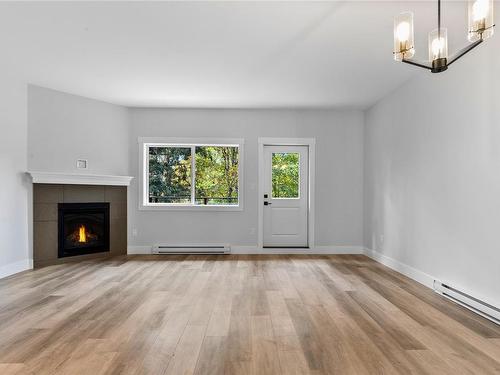 26-3195 Herons Way, Duncan, BC - Indoor Photo Showing Living Room With Fireplace