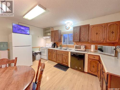 320 1St Street N, Christopher Lake, SK - Indoor Photo Showing Kitchen With Double Sink
