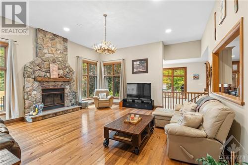 1465 Squire Drive, Ottawa, ON - Indoor Photo Showing Living Room With Fireplace