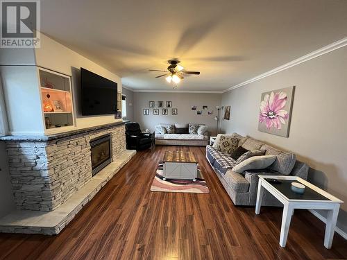 5228 40 Street, Fort Nelson, BC - Indoor Photo Showing Living Room With Fireplace