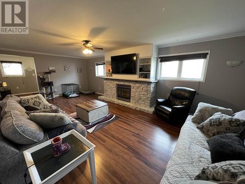 5228 40 Street, Fort Nelson, BC - Indoor Photo Showing Living Room With Fireplace