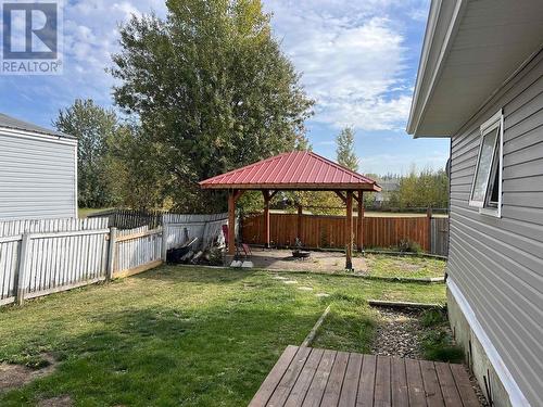 5228 40 Street, Fort Nelson, BC - Outdoor With Deck Patio Veranda With Backyard
