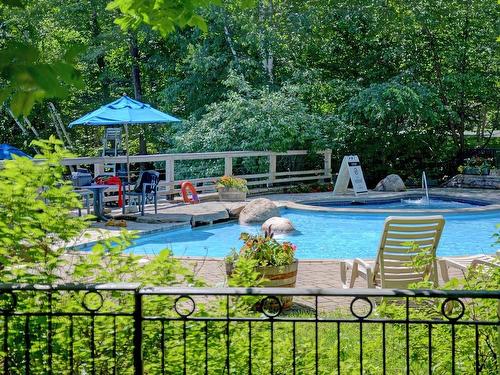 Pool - 5-114 Ch. Des Quatre-Sommets, Mont-Tremblant, QC - Outdoor With In Ground Pool With Deck Patio Veranda