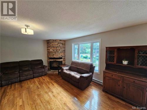 1206 Christie, Beresford, NB - Indoor Photo Showing Living Room With Fireplace