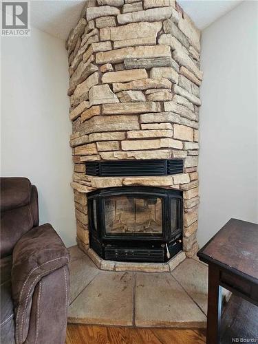 1206 Christie, Beresford, NB - Indoor Photo Showing Living Room With Fireplace