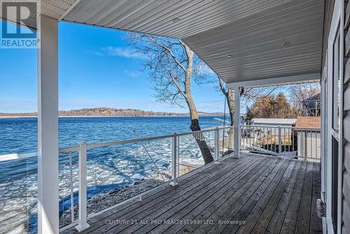 174 Sandy Bay Rd, Alnwick/Haldimand, ON - Outdoor With Body Of Water With Deck Patio Veranda With View With Exterior