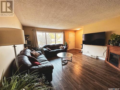 63 Circlebrooke Drive, Yorkton, SK - Indoor Photo Showing Living Room With Fireplace