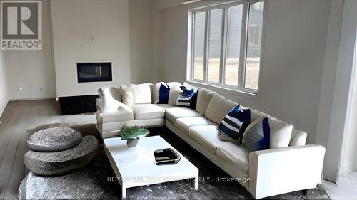 4 Del Ray Cres, Wasaga Beach, ON - Indoor Photo Showing Living Room With Fireplace