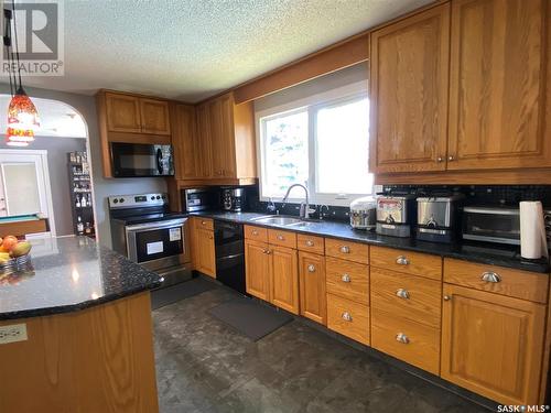 1704 Gregory Drive, North Battleford, SK - Indoor Photo Showing Kitchen With Double Sink