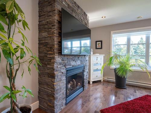 Salon - 2340 Rue De La Commune, Drummondville, QC - Indoor Photo Showing Living Room With Fireplace