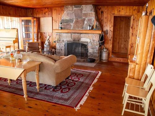 2 Whitefish Bay Island 19, Sioux Narrows, ON - Indoor Photo Showing Living Room With Fireplace