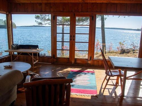 2 Whitefish Bay Island 19, Sioux Narrows, ON - Indoor Photo Showing Dining Room With Body Of Water