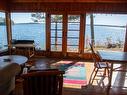 2 Whitefish Bay Island 19, Sioux Narrows, ON  - Indoor Photo Showing Dining Room With Body Of Water 