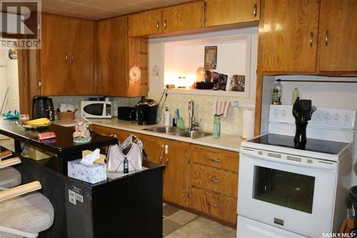 25 Burgess Street, Fleming, SK - Indoor Photo Showing Kitchen With Double Sink